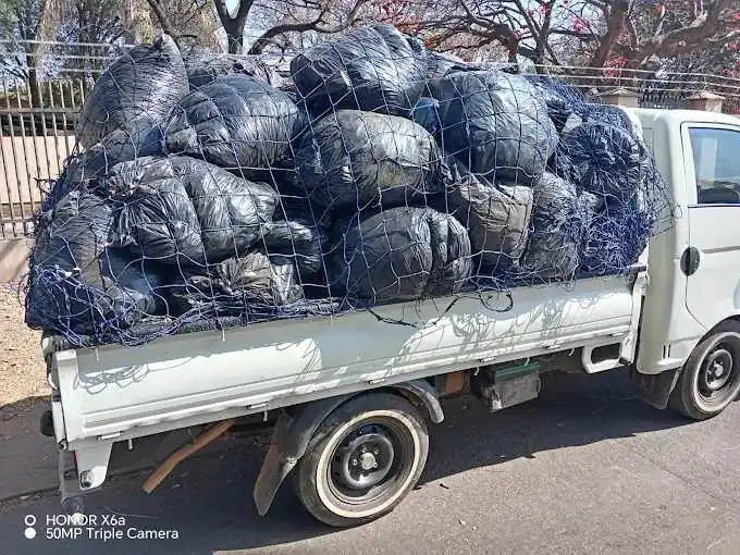 Rubble bags fully loaded on truck, waste removal Pretoria East